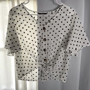 Black and white polkadot shirt